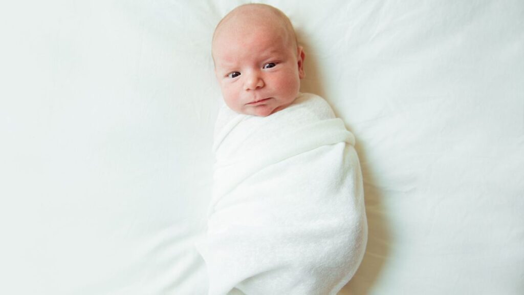 baby in velcro swaddle