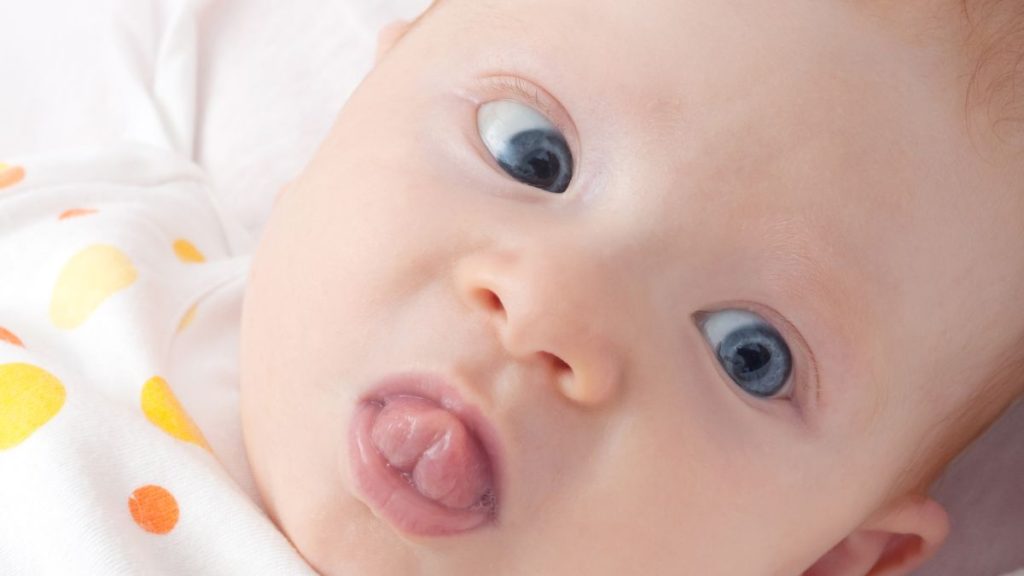 baby chewing on tongue